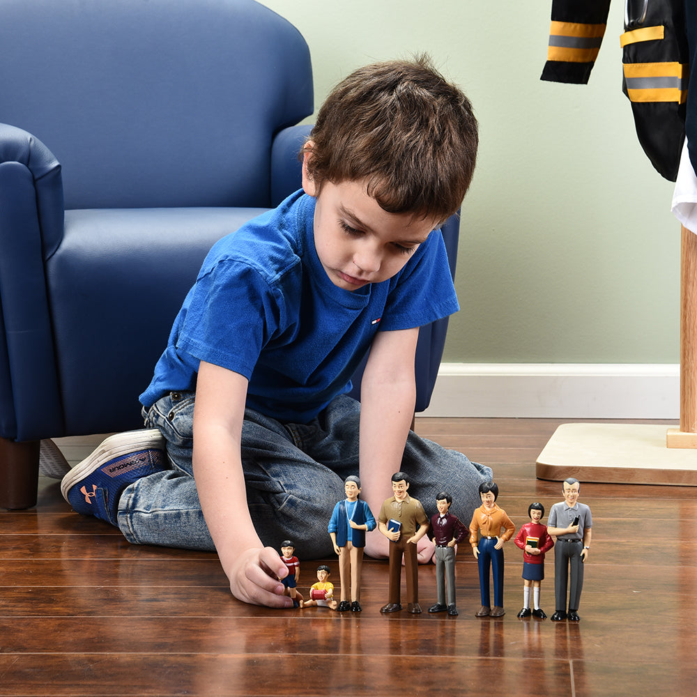 Lining Up the Asian Family Figures in the Classroom