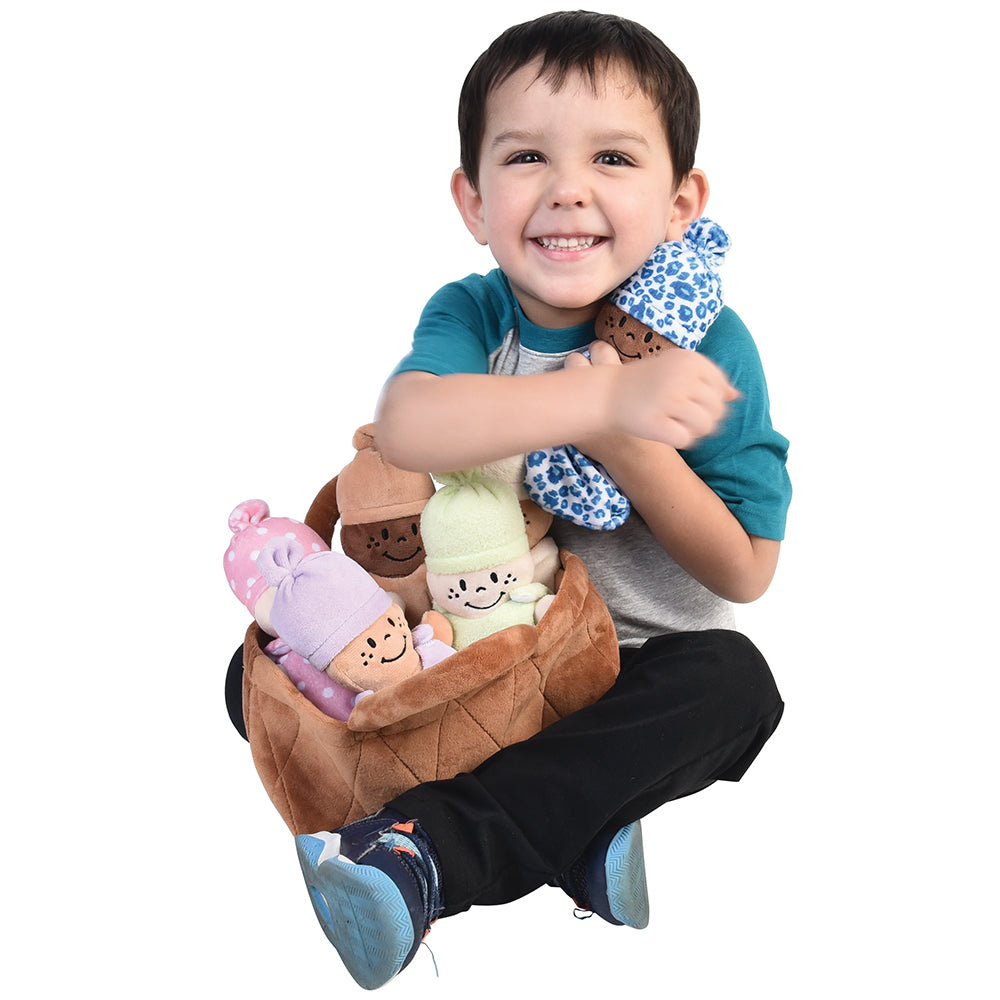 Cuddling with Plush Baby Dolls