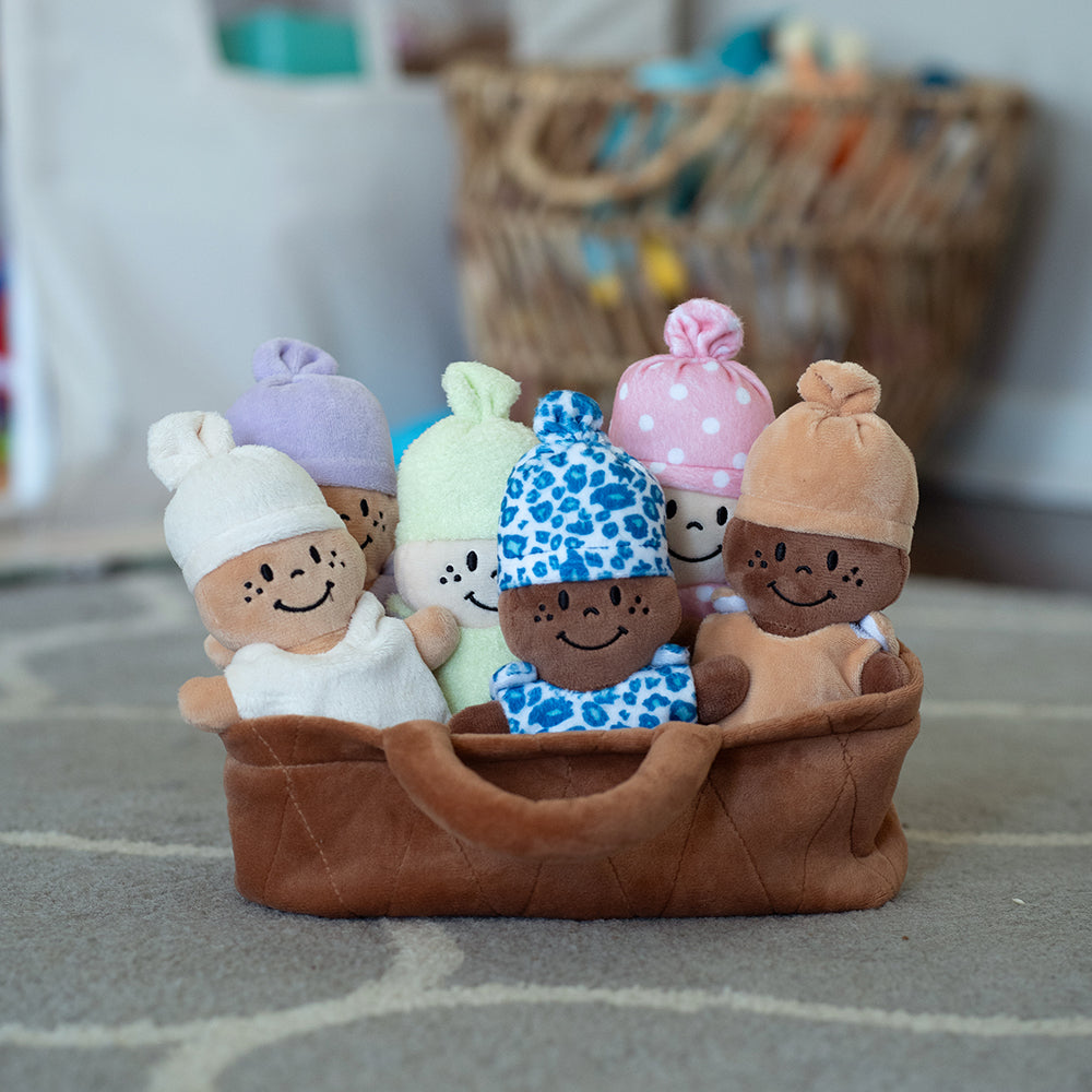 6 Baby Dolls in a Plush Basket