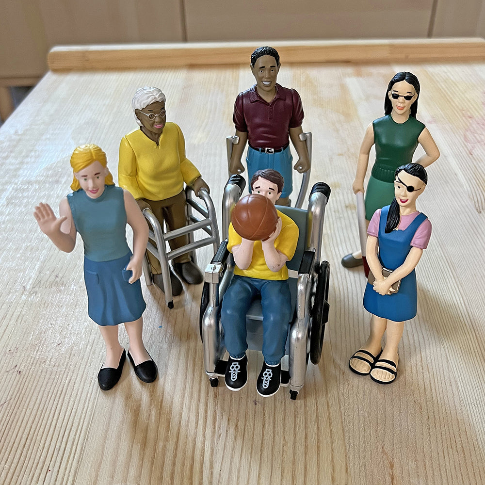 Inclusive Friends with Diverse Abilities Vinyl Figure Set on a Table
