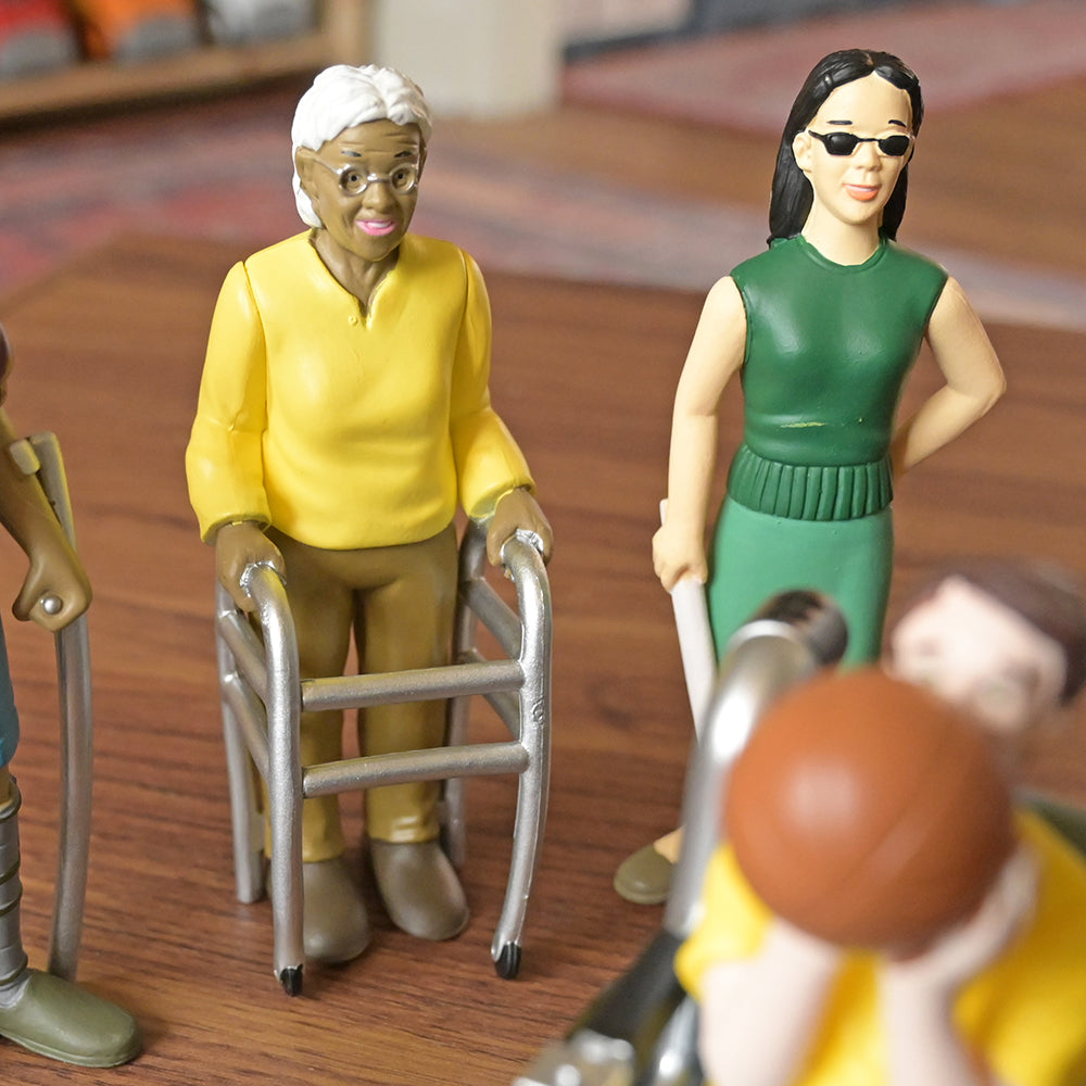 Close-up Shot of Inclusive Friends with Diverse Abilities Vinyl Figure Set
