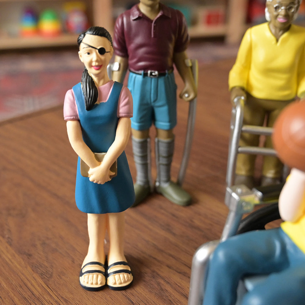 Close-up Shot of Inclusive Friends with Diverse Abilities Vinyl Figure Set