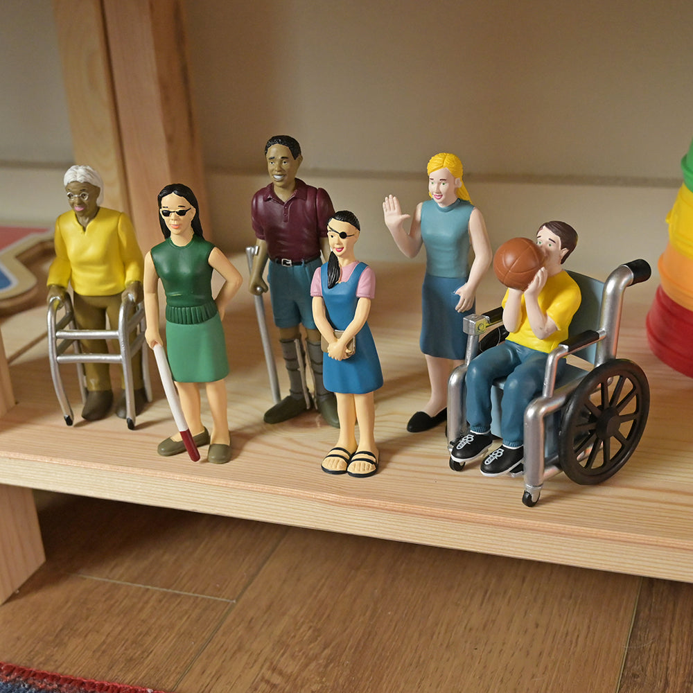 Inclusive Friends with Diverse Abilities Vinyl Figure Set on a Shelf