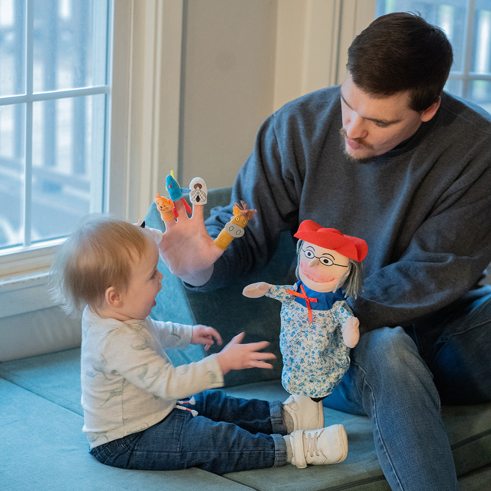 Adult & Baby Engaging with There Was an Old Lady Storytelling Puppet & Props Set