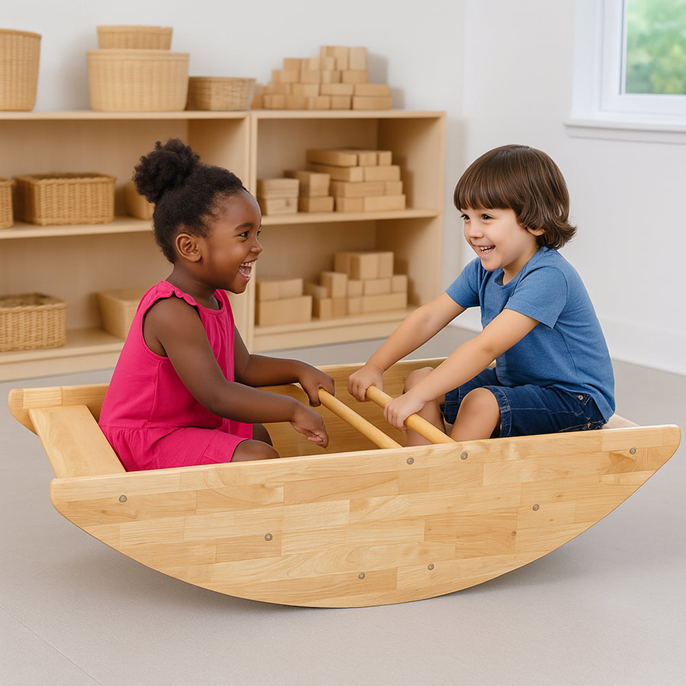 Two children playing on a wooden rocking toy in a classroom setting.
