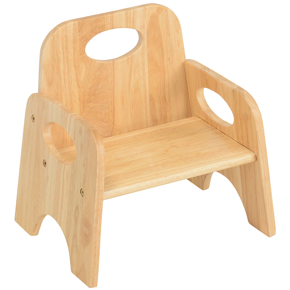 A small, wooden toddler chair with rounded edges and hand holds for stacking.