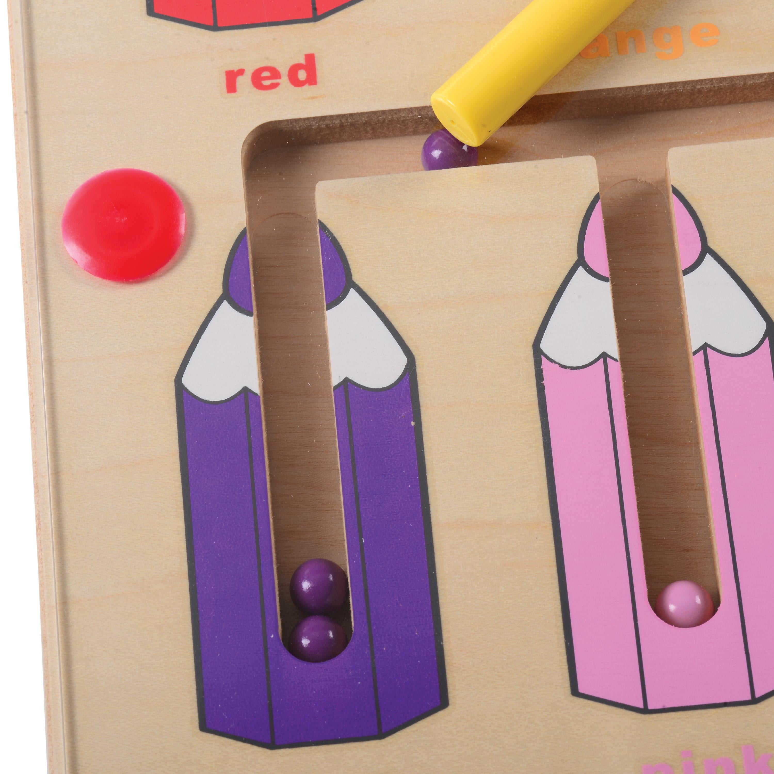 Educational toy with color sorting mechanism on a wooden base