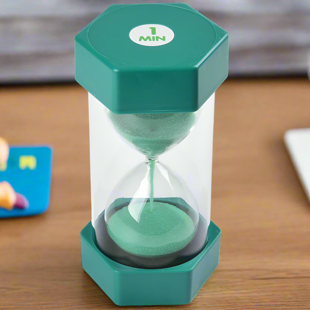 Green 1 Minute Sand Timer on a Classroom Desk