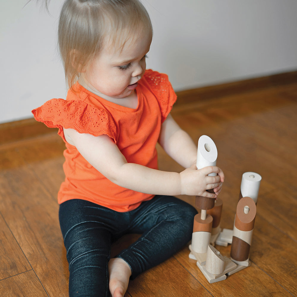 Toddler Interacting with Natural Geo Stacker