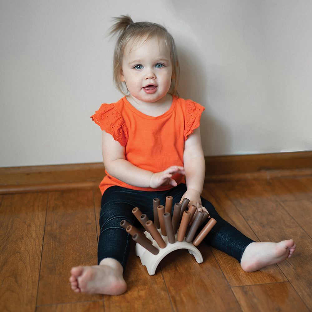 Toddler Playing with Eco-Friendly Wooden Jiggle Sticks