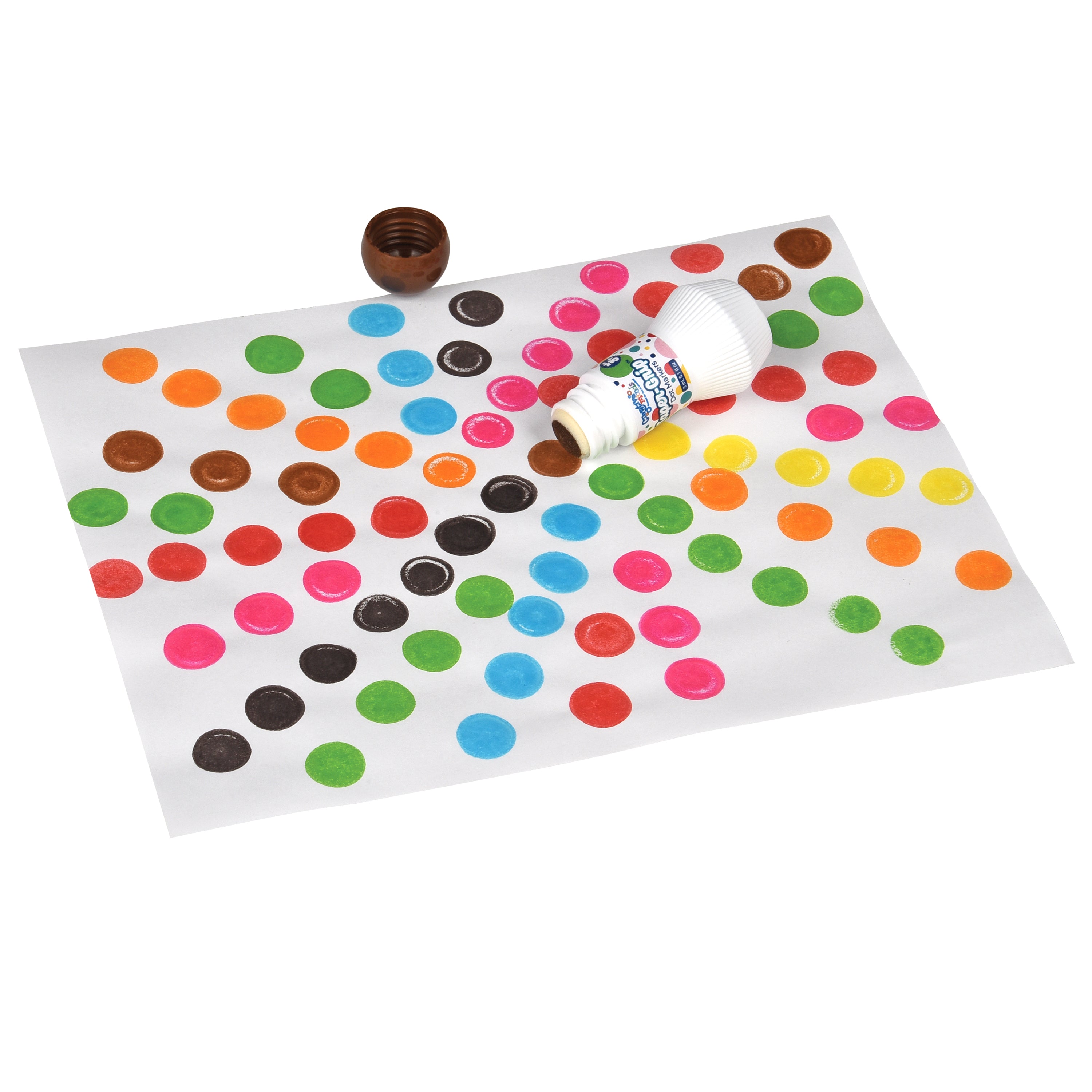 Colorful dot paper with a bottle cap and small ball on a white background