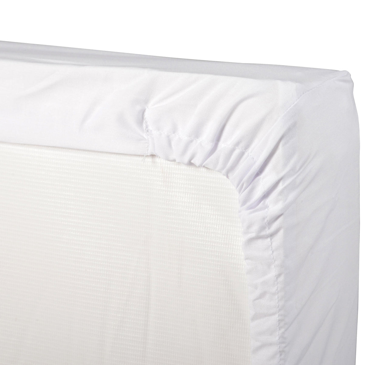 A close-up of a white fitted sheet or mattress cover with gathered elasticized corners, shown against a white background.