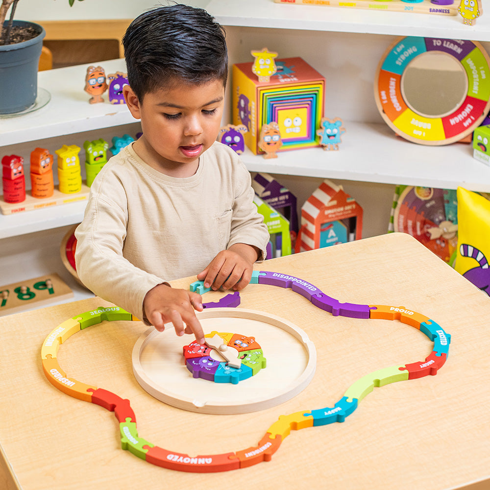 Child playing with a colorful wooden toy in a playroom.
