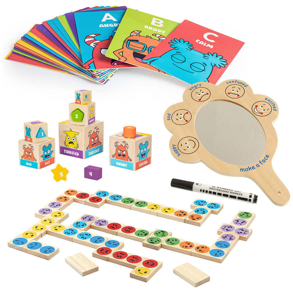 Assorted educational toys including blocks, cards, and a mirror on a white background