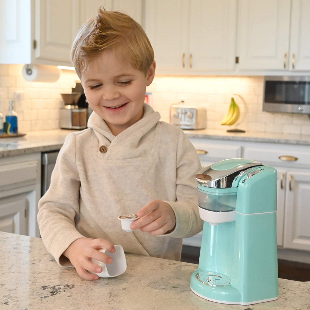 Kid Having Fun with Realistic Coffee Maker