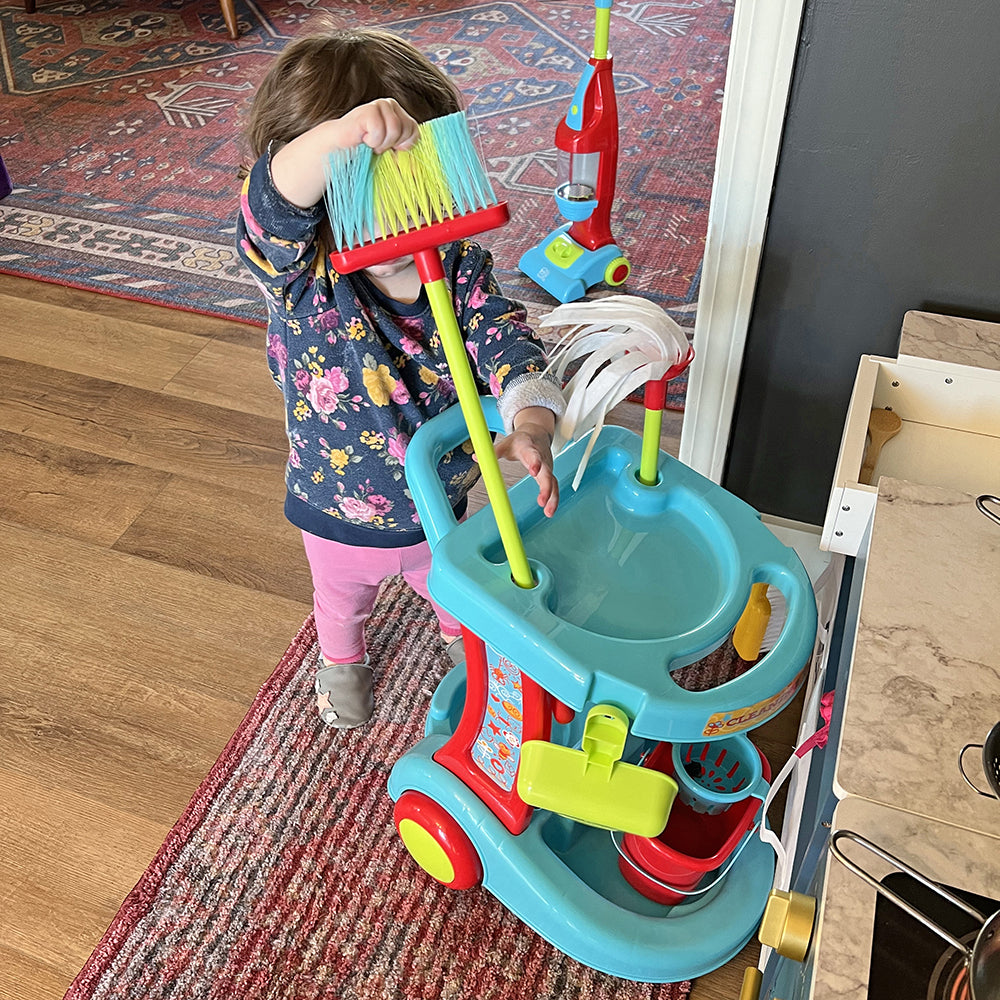 Getting the broom from the Cleaning Trolley