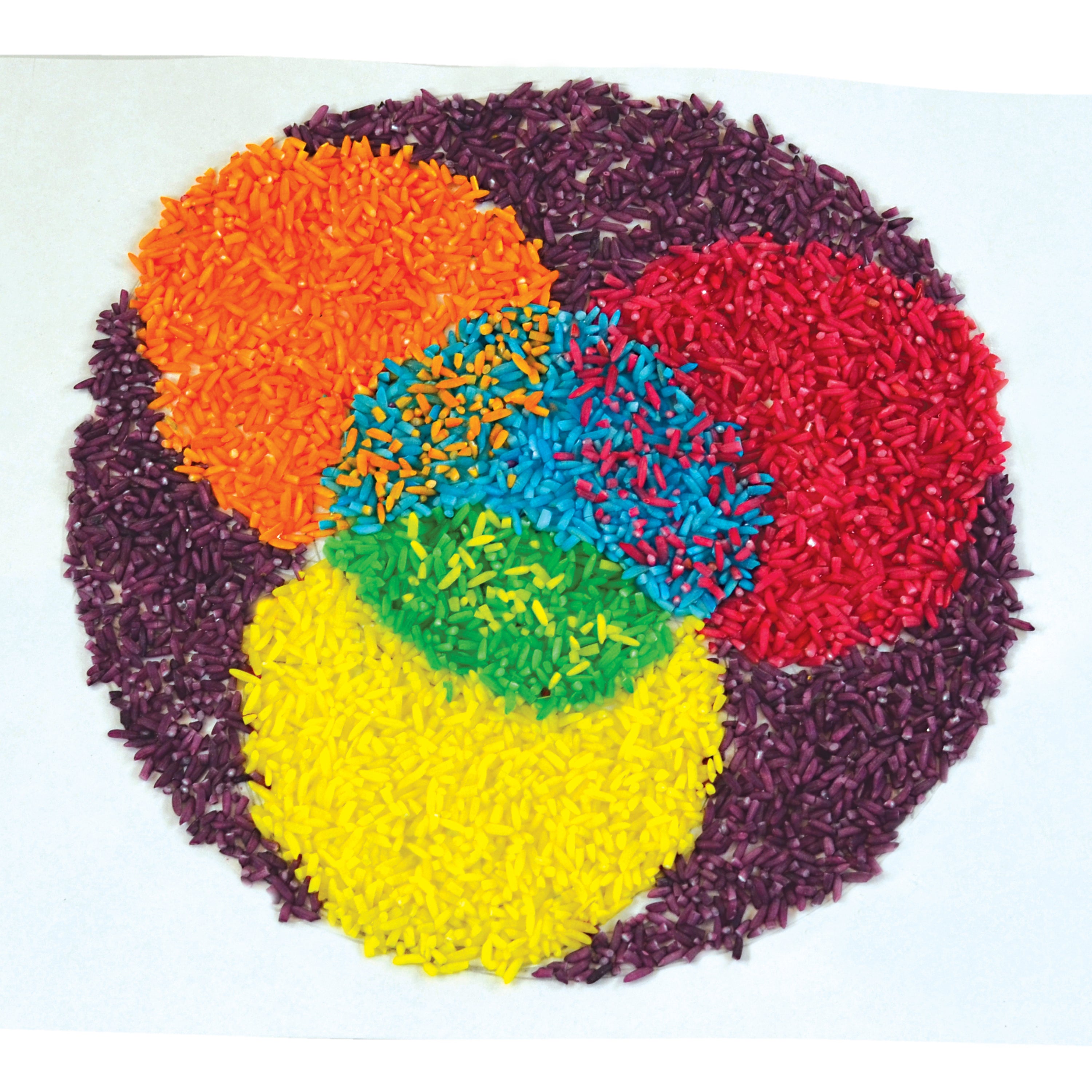 Colorful rice grains arranged in a circular pattern on a white background