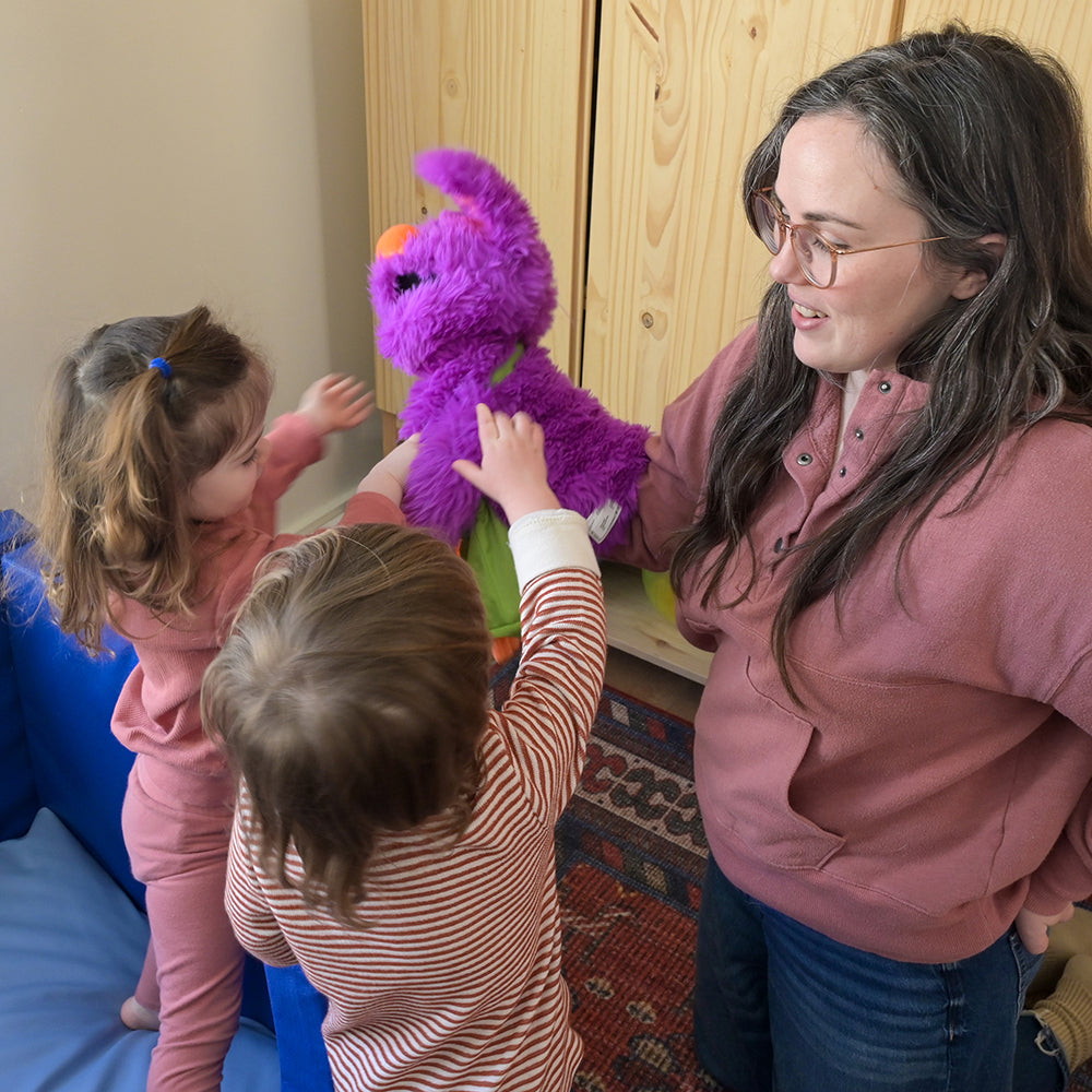 Toddlers Being Entertained with Edgar the Emotions Puppet