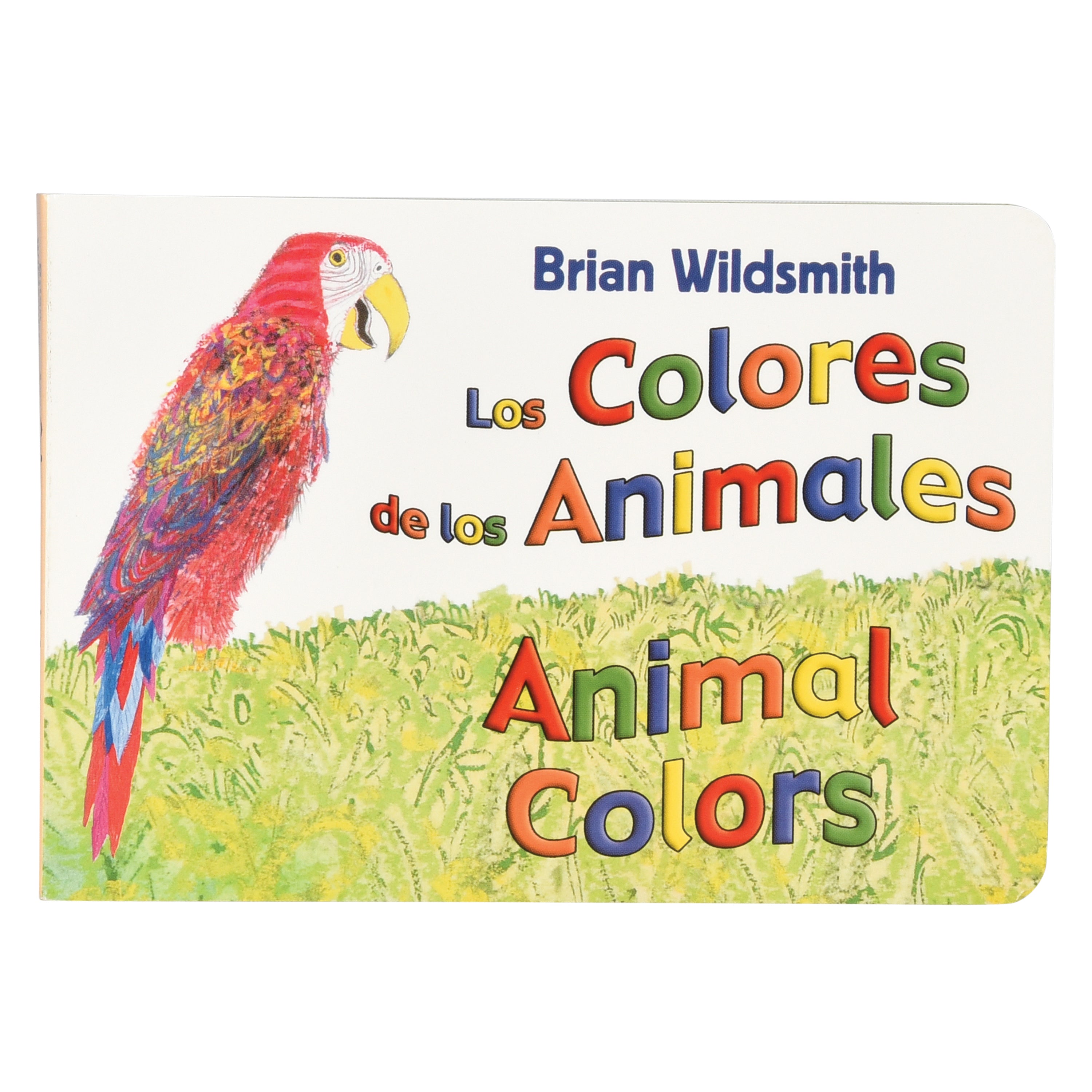 Spanish children's board book titled 'Los Colores de los Animales / Animal Colors' by Brian Wildsmith, featuring a colorful parrot on a green grassy background.