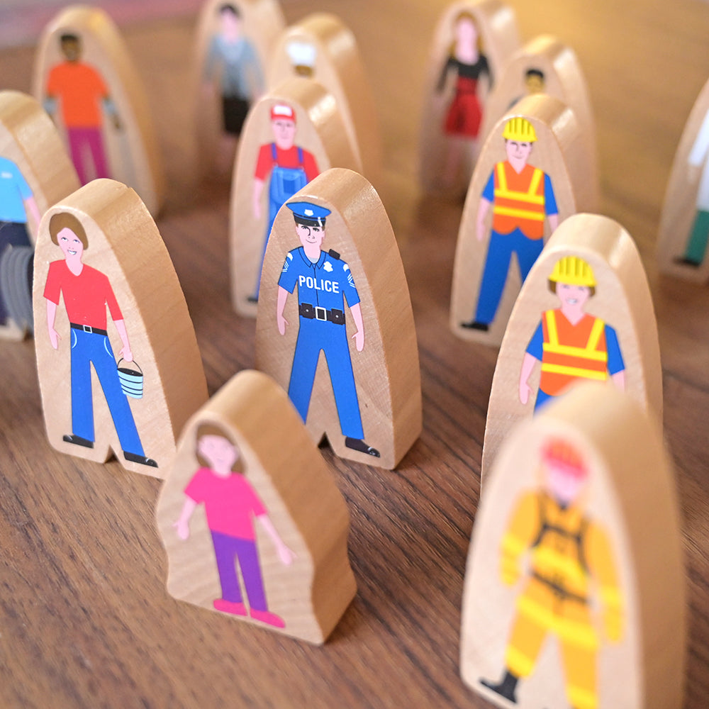 Close-up of Multicultural Wooden Community Figures