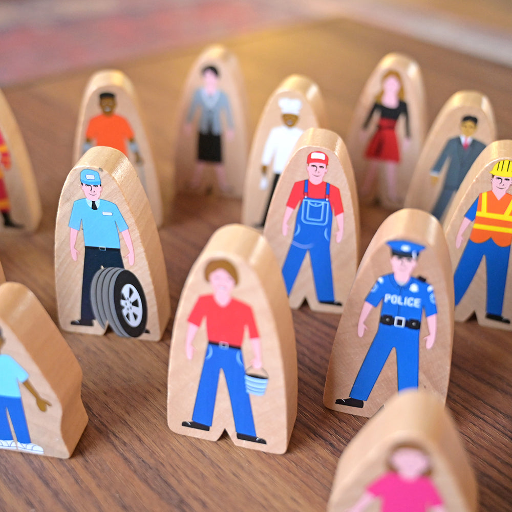 Close-up of Multicultural Wooden Community Figures