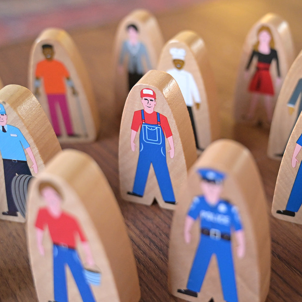 Close-up of Multicultural Wooden Community Figures