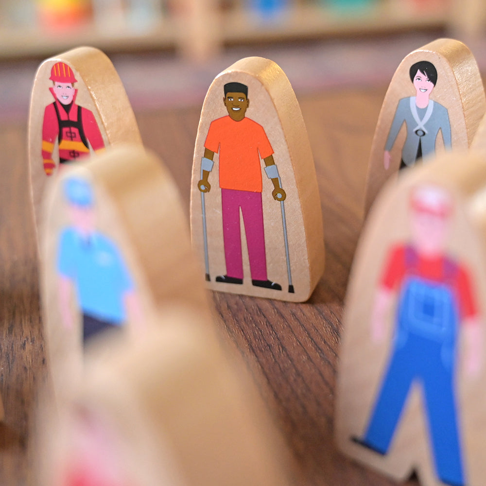Close-up of Multicultural Wooden Community Figures
