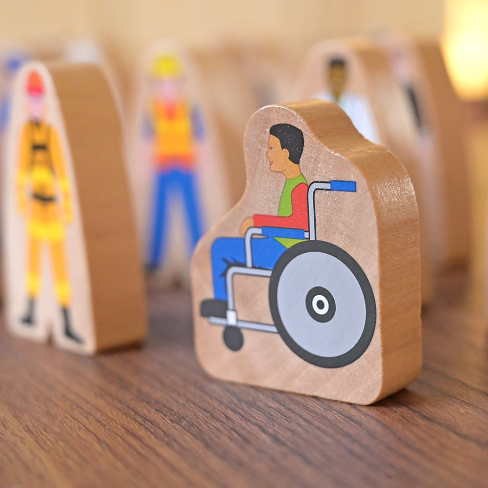 Close-up of Multicultural Wooden Community Figures