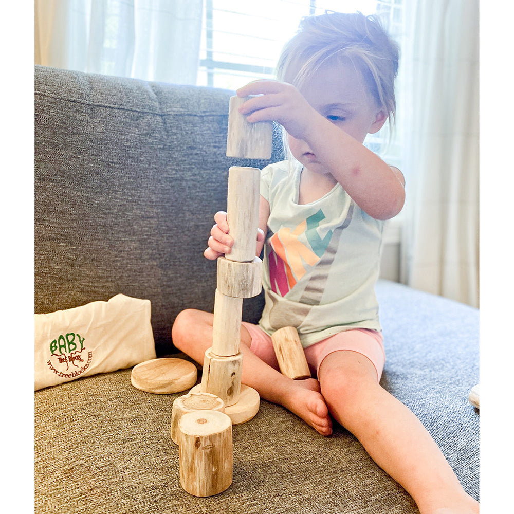 Child Building with Baby Tree Blocks