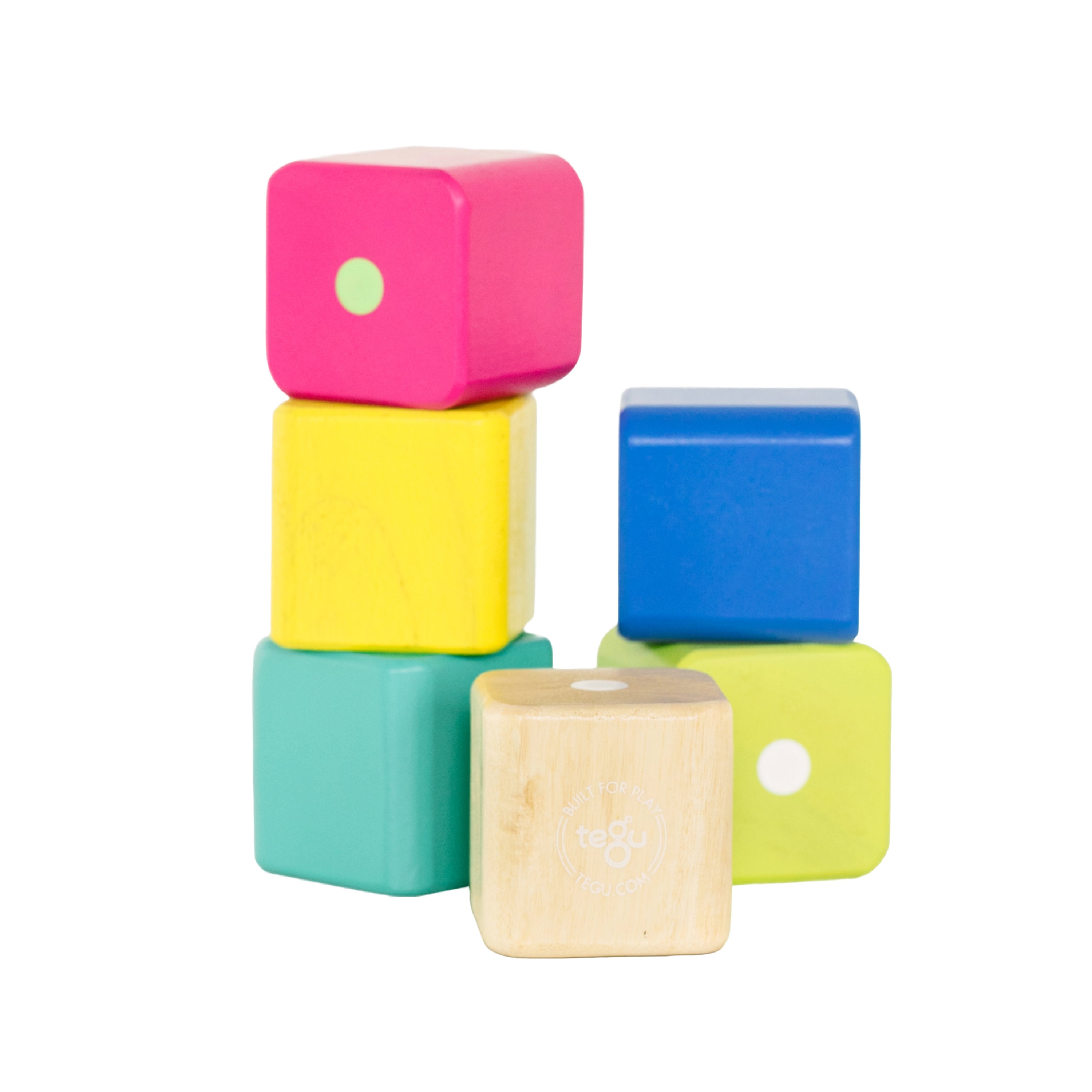 Colorful wooden blocks stacked on a white background