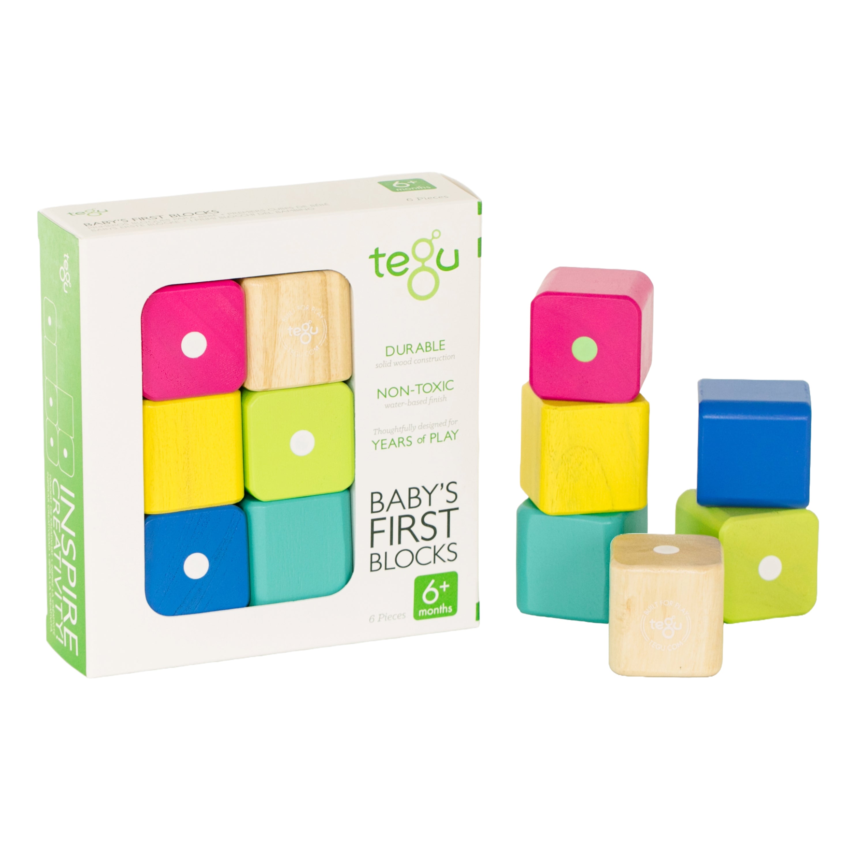 Tegu Baby's First Blocks set with colorful wooden blocks and packaging on a white background