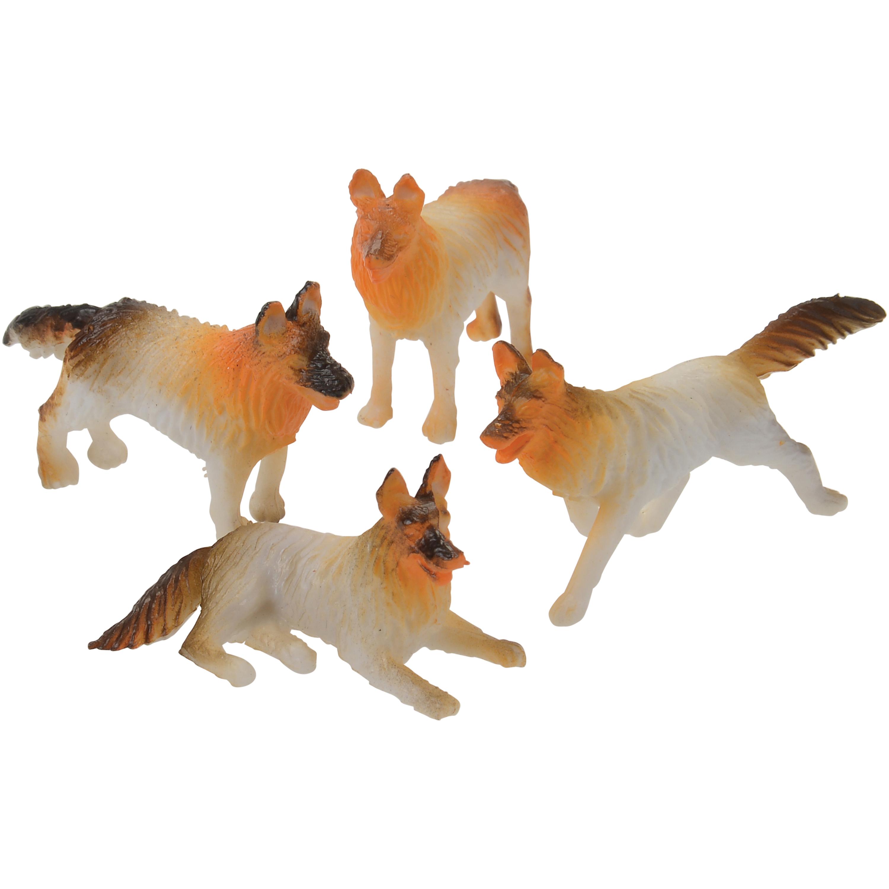 Four toy dog figures in different poses on a white background