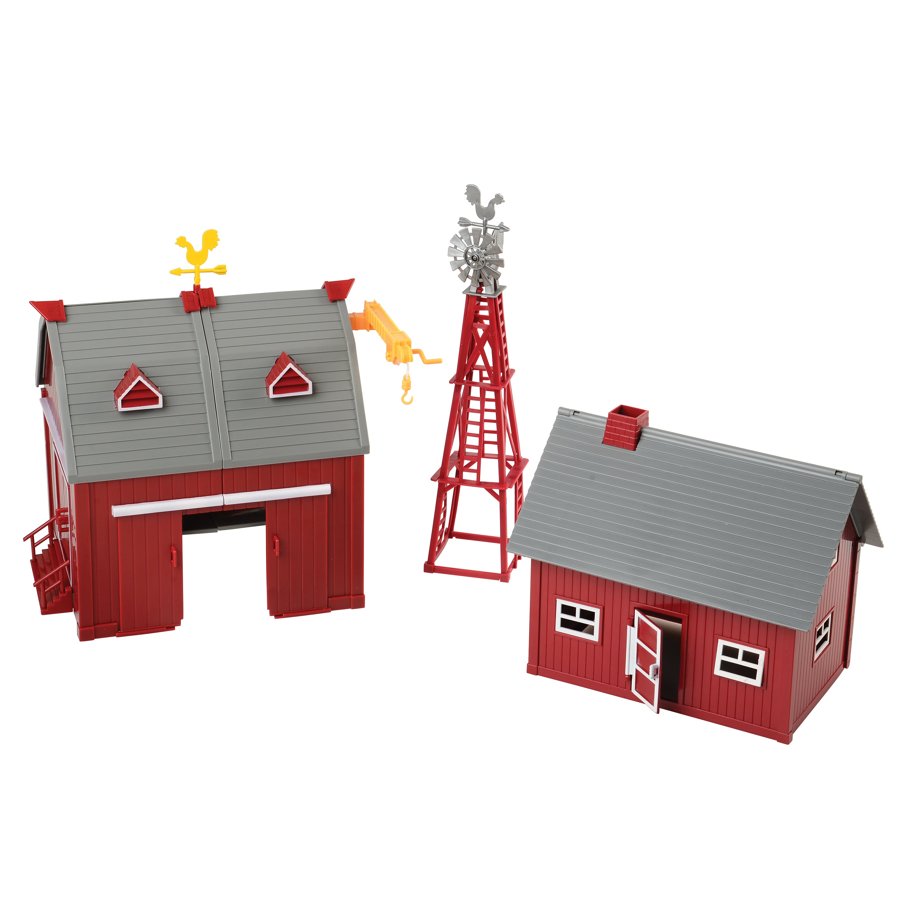Model barns with a windmill on a white background
