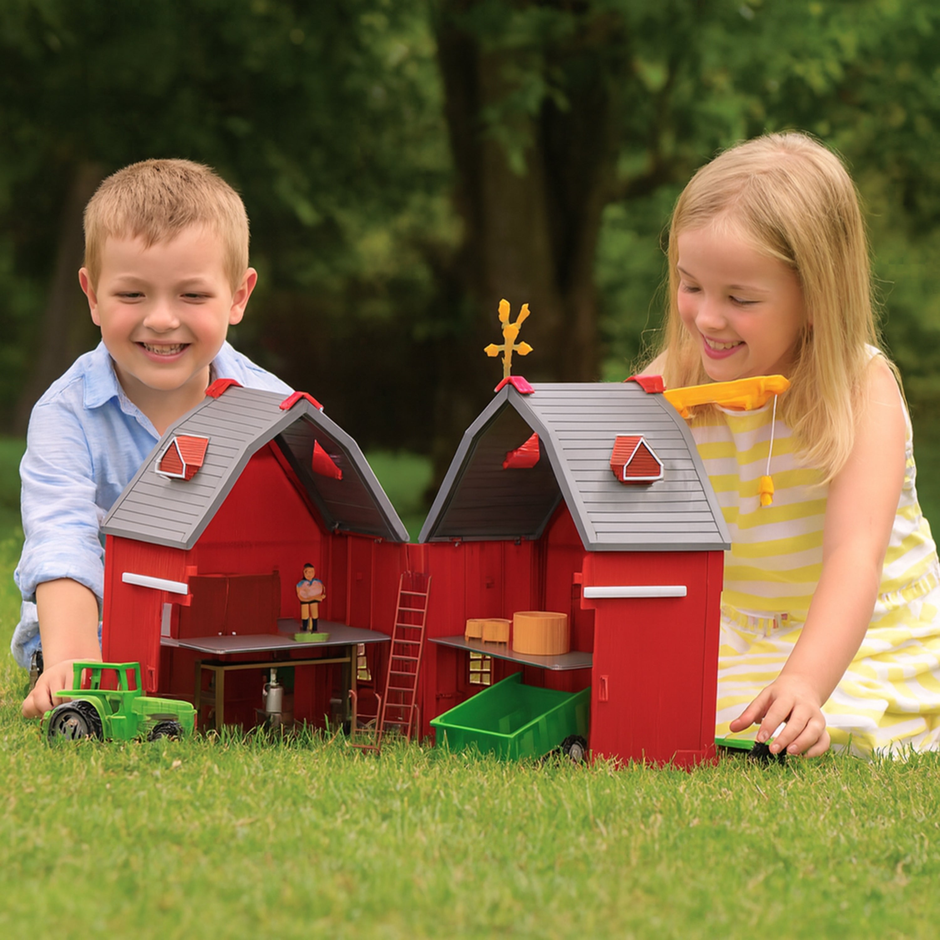 Two children playing with a toy barn set outdoors.