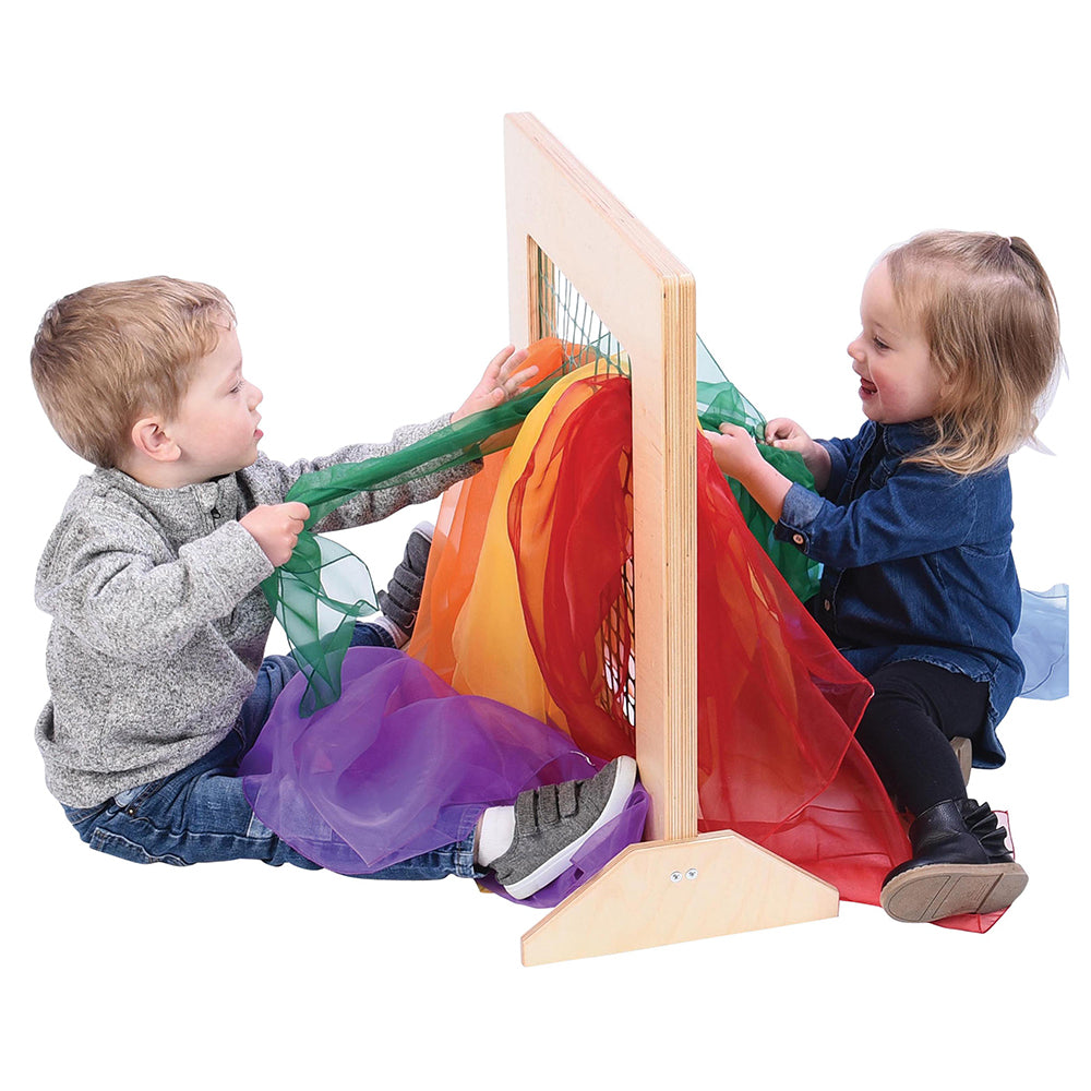 Two Toddlers Engaging with Classroom Weaving Frame with Colorful Scarves