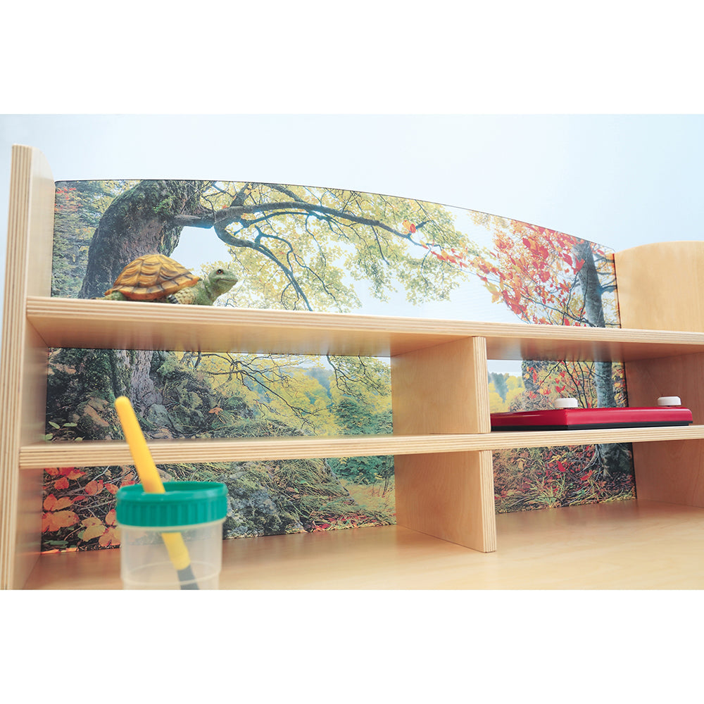 Wooden shelf with a scenic print and various items on a white background