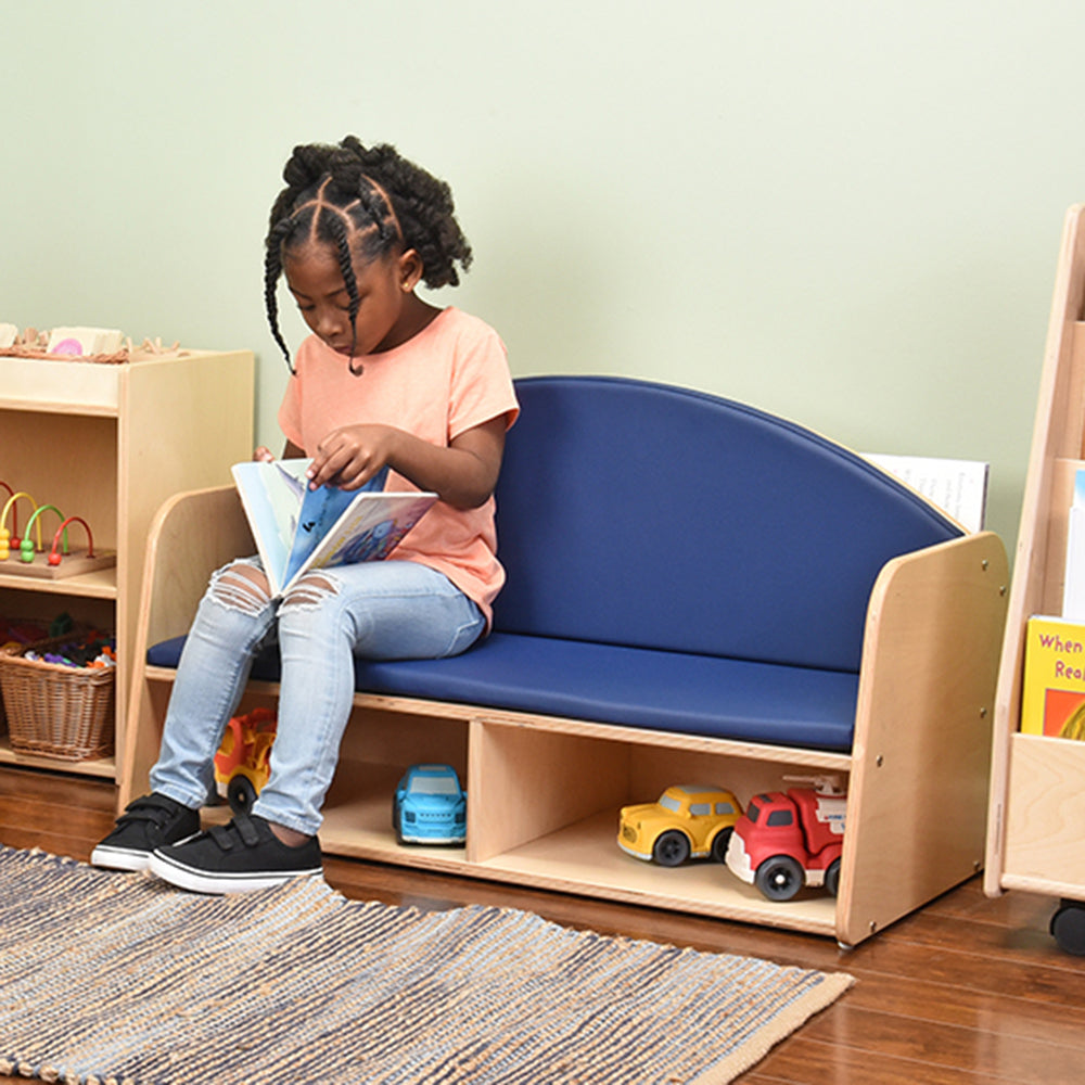 Kid Reading Book while Seated on Classic Classroom Couch
