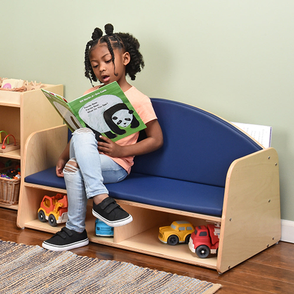 Kid Reading Book while Seated on Classic Classroom Couch