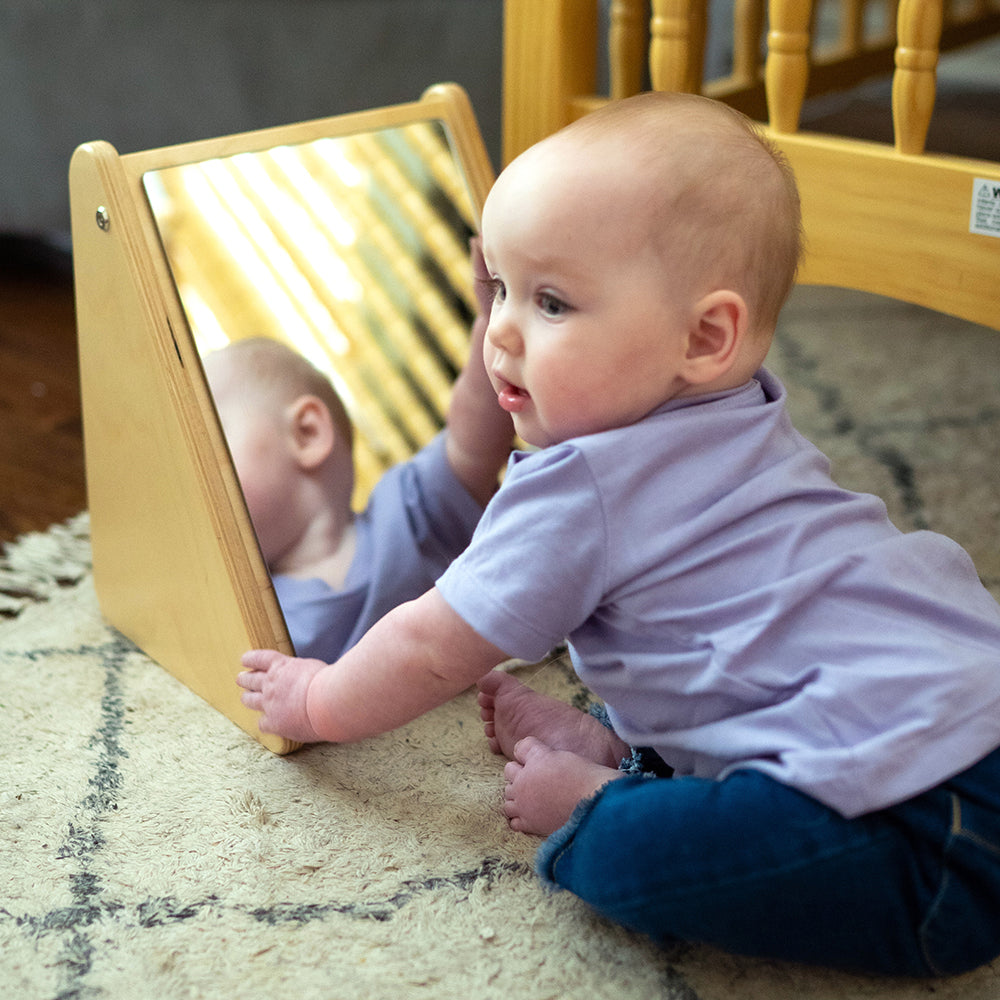 Infant Engaging with Peek-A-Boo Angled Mirror in a nursey
