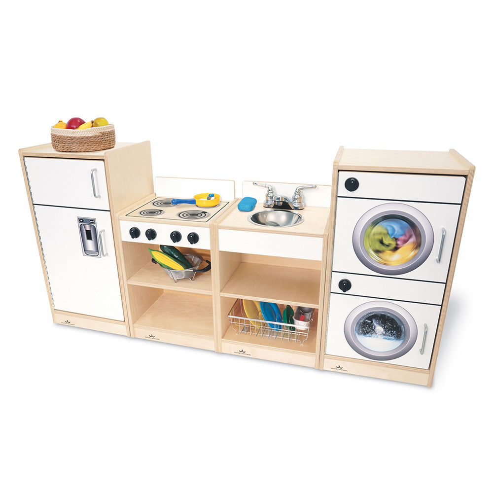 Children's play kitchen set with wooden cabinets, stove, sink, and washing machine on a white background.