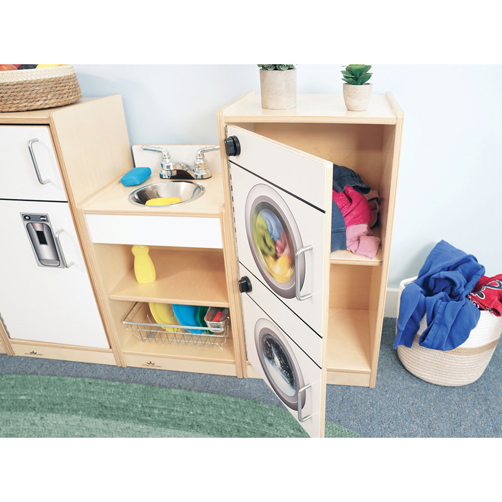 Children's play kitchen set with washing machine and dryer compartments.