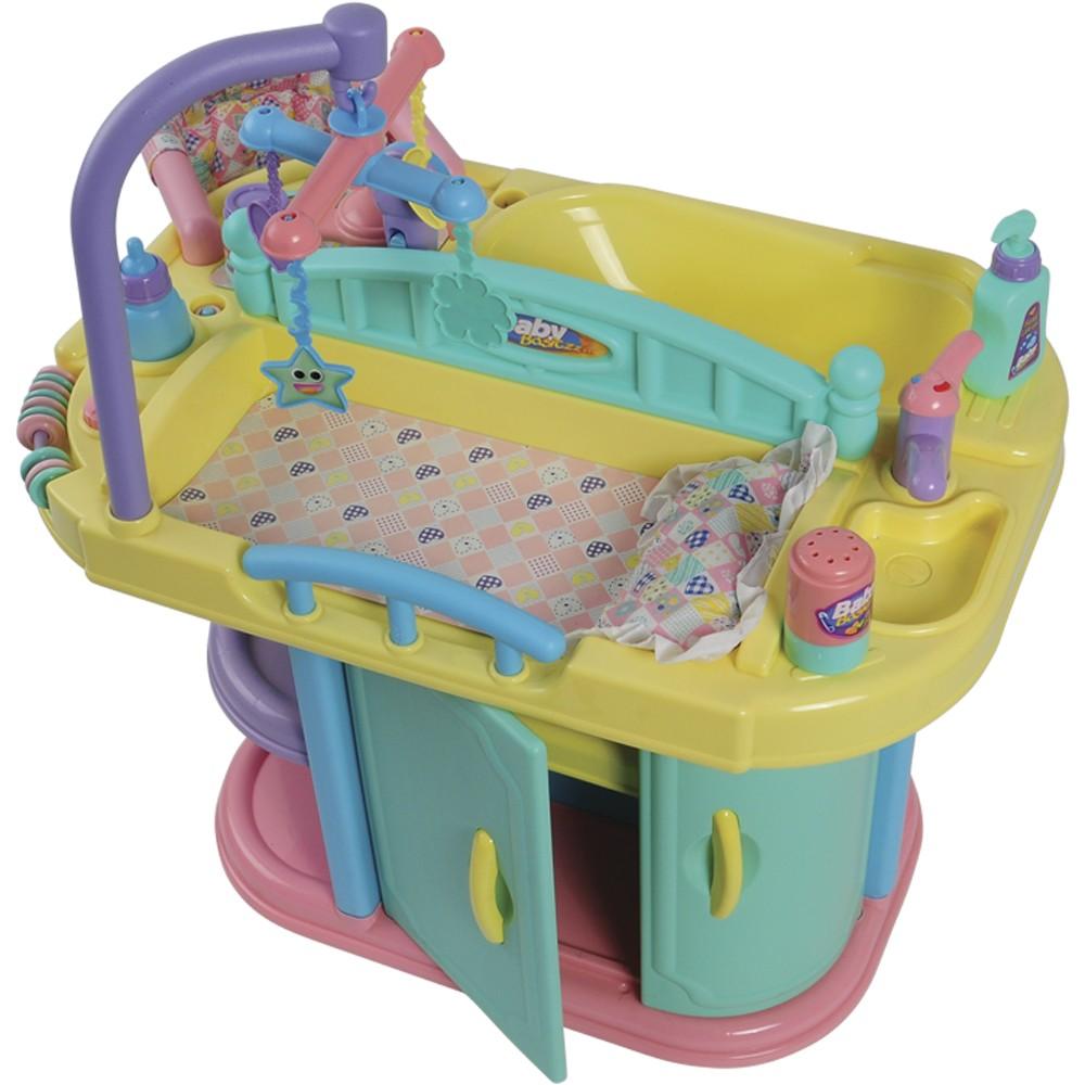 A colorful baby play bath tub toy set on a white background, featuring a yellow tub, mint green changing area, pink base, and pastel accessories including bottles, a sponge, and a hanging star.