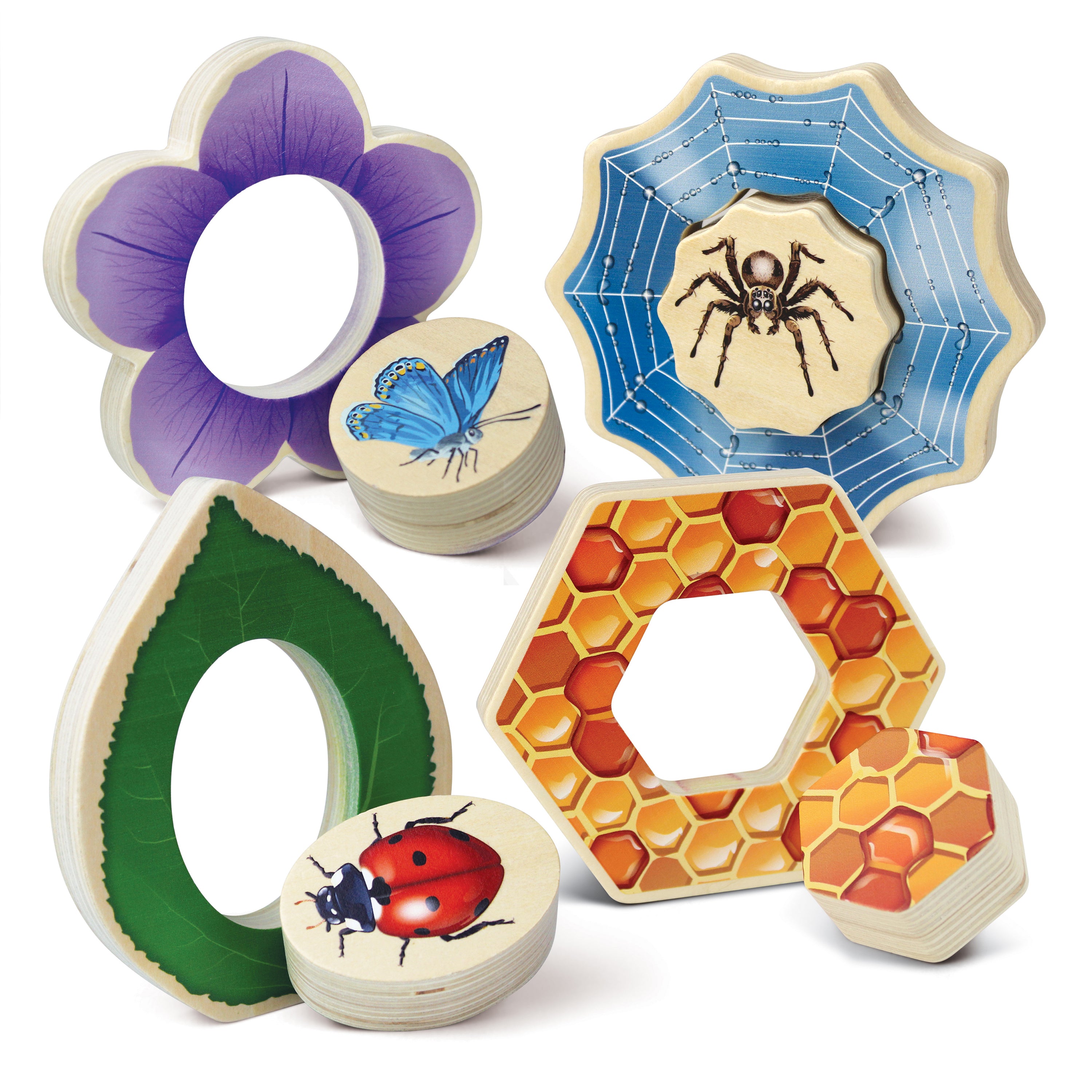 Wooden educational toys with floral, spider web, and honeycomb designs on a white background