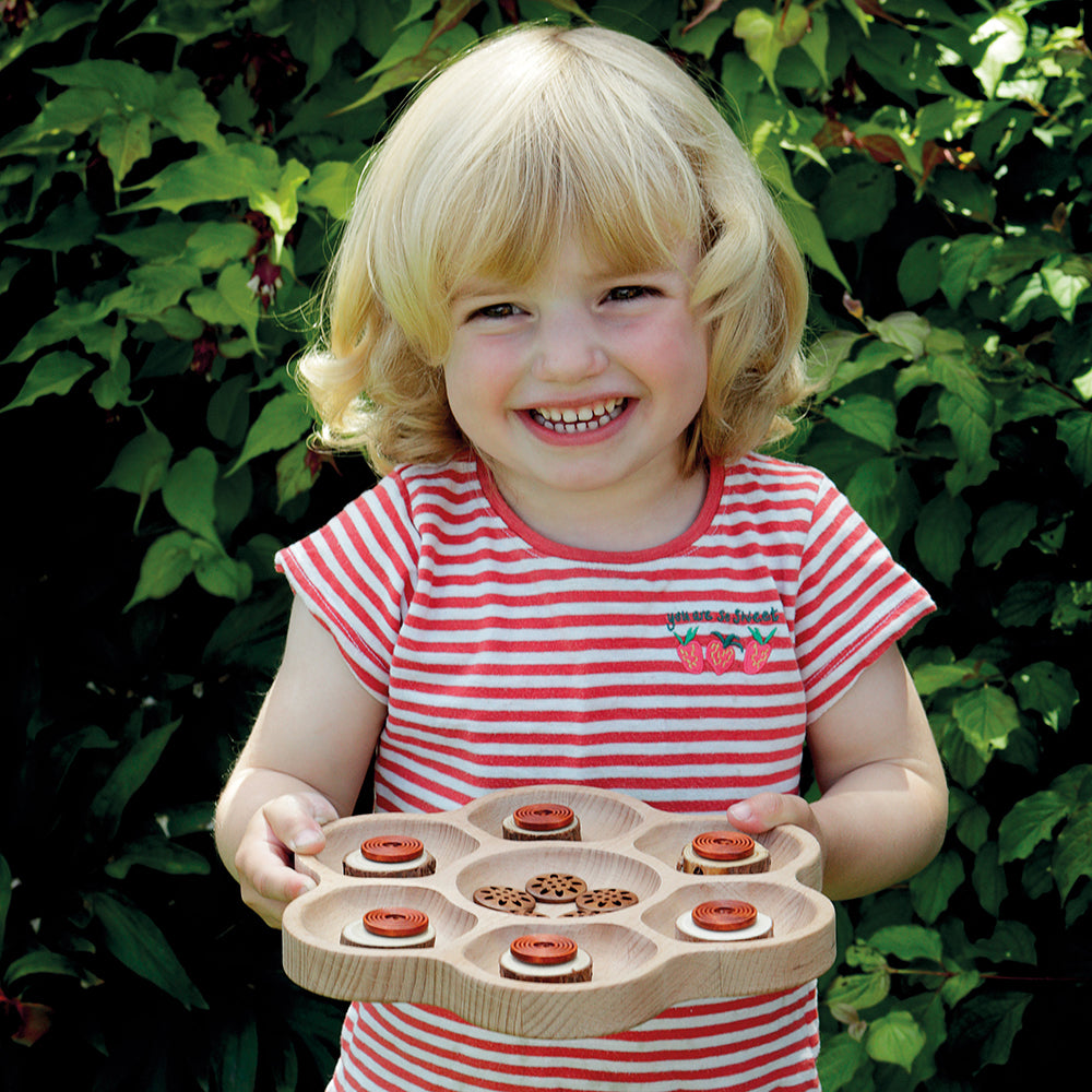 Kid Sorting with Flower-shaped Tray Outdoors