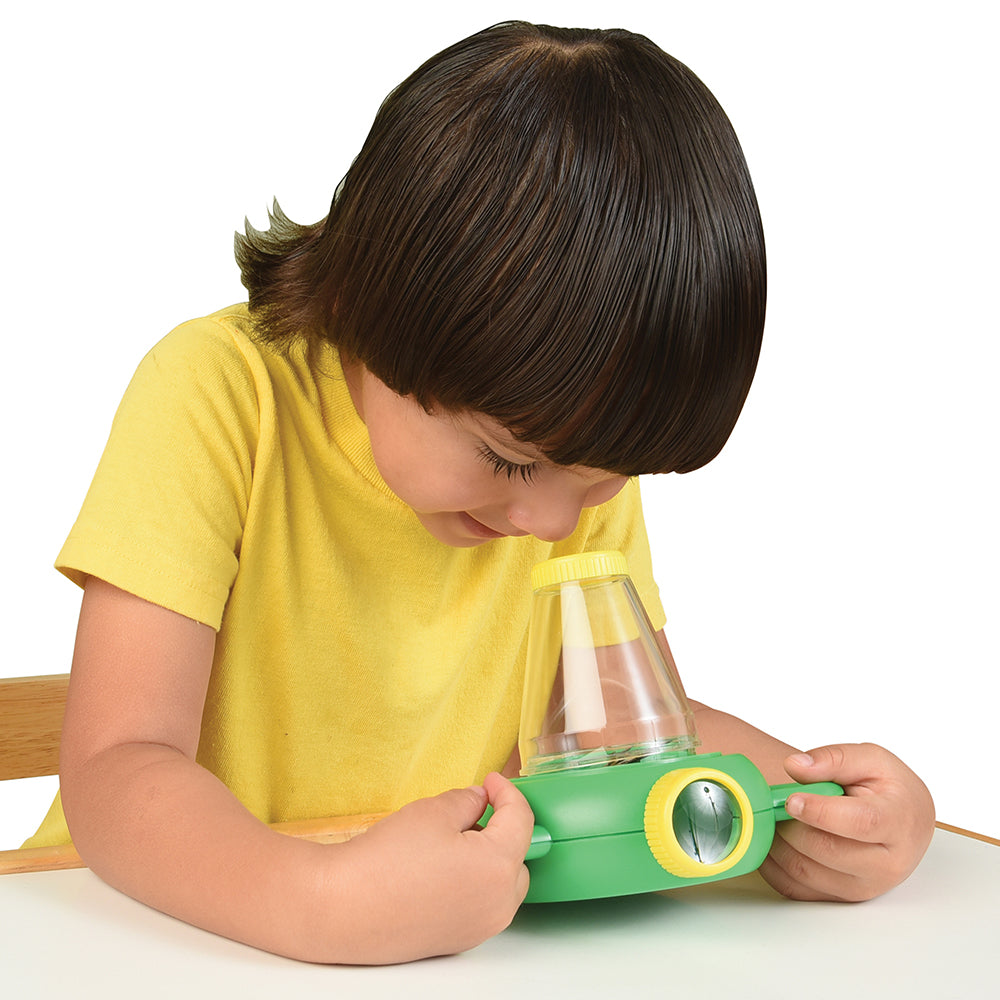 Kid Using Dual View Nature Explorer Microscope as a Bug Viewer