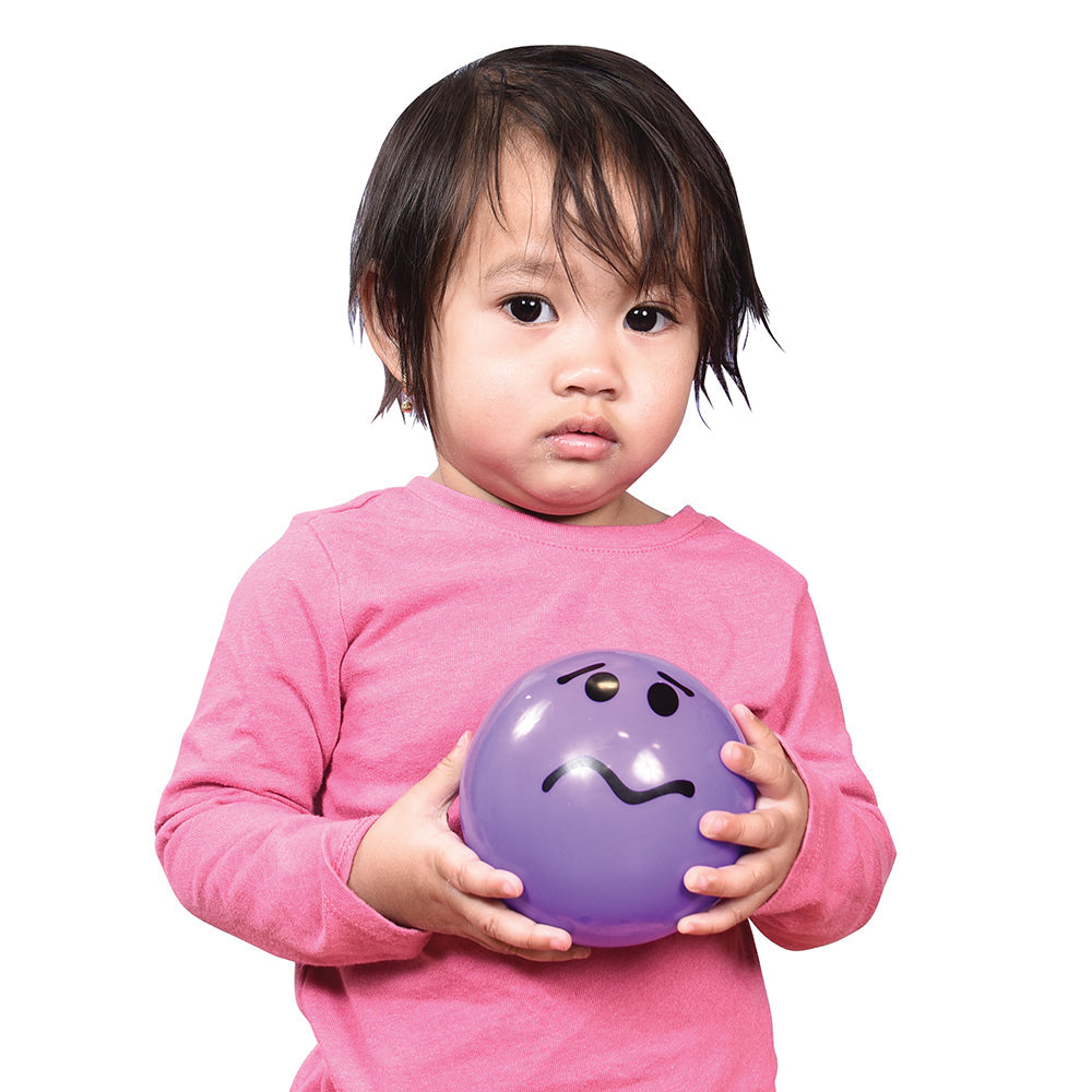 Toddler Holding Worry-Faced Purple Ball