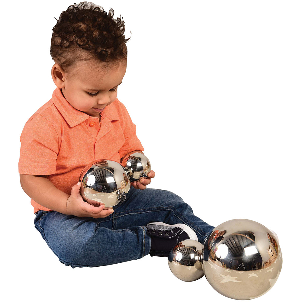 Toddler Engaging with Sensory Reflective Mirror Balls Set