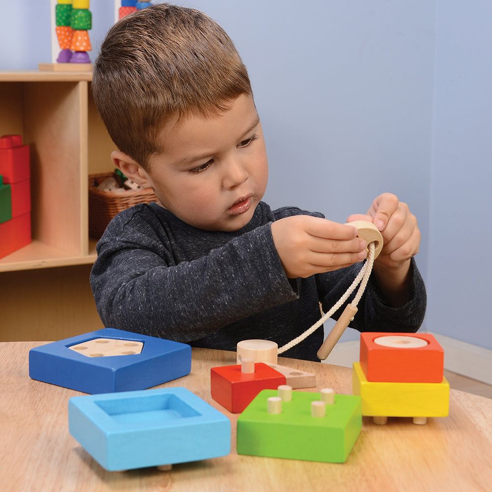 Developing Hand Eye Coordination by Threading Thru Shapes