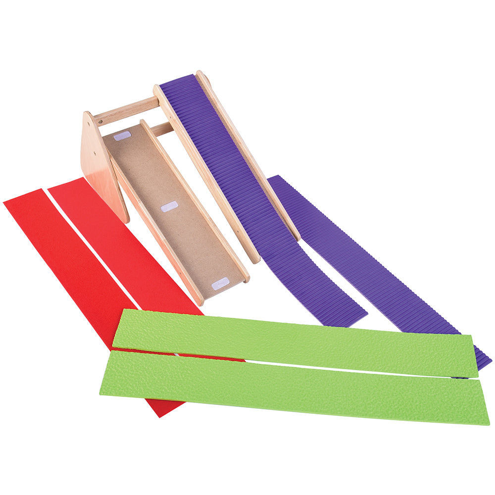 A set of colorful wooden ramps with removable, textured coverings designed for educational play.