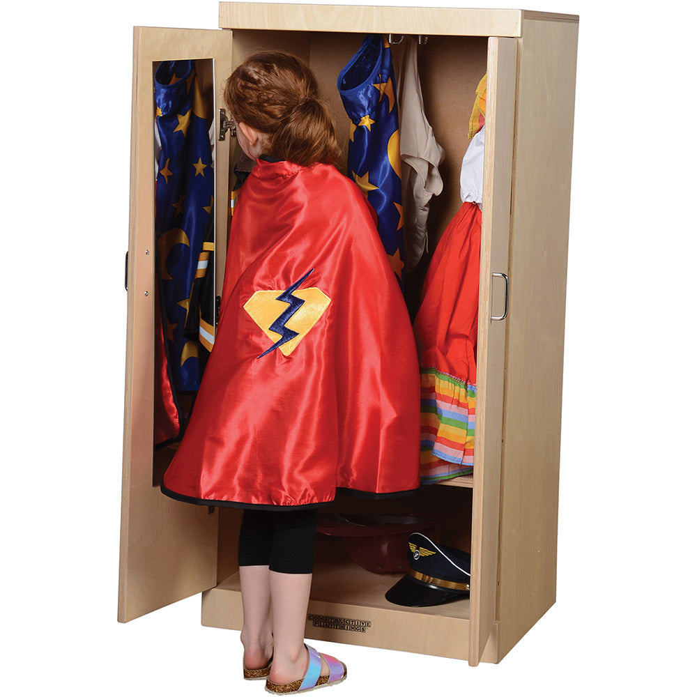 Kid Posing with Cape In Front of Child-Sized Wooden Dress Up Cupboard with Mirror
